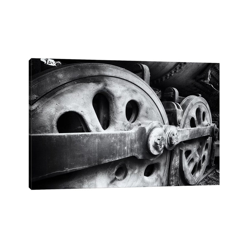 Close Up View Of Wheels Of A Steel Locomotive by George Oze - Wrapped Canvas Print, 30.48 cm H x 45.72 cm W