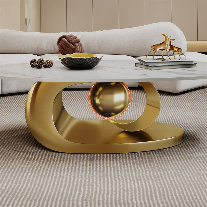 Table basse en marbre avec base sculpturale en acier inoxydable, Doré
