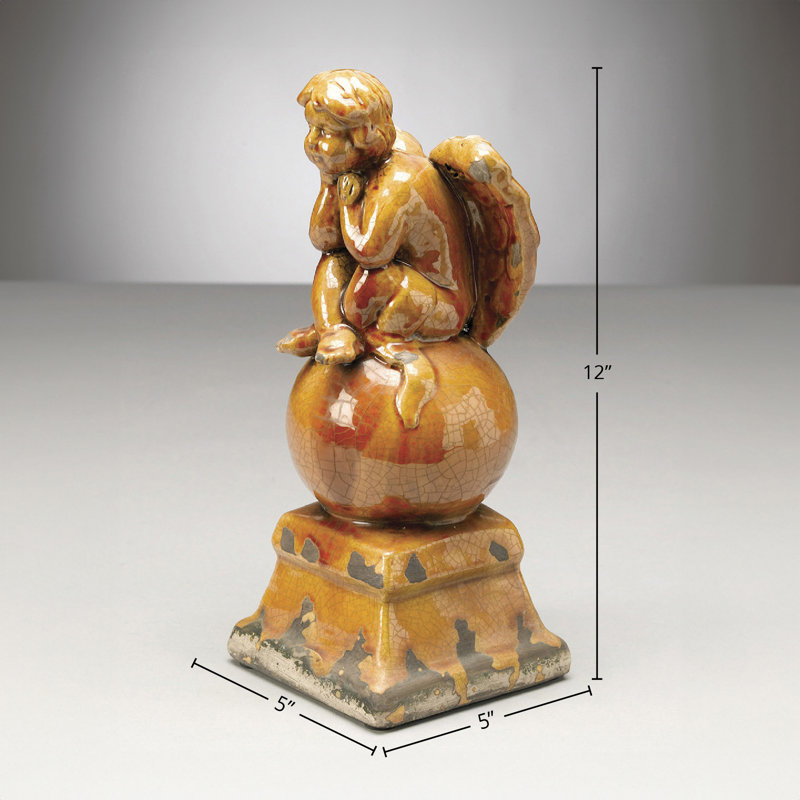 Angel Sitting on Ball Figurine