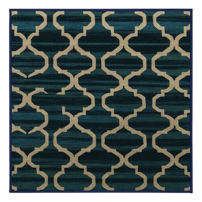 Tapis gris en treillis lavable à la machine