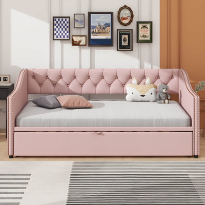 Twin-Sized Upholstered Daybed With A Pop-Up Trundle Feature