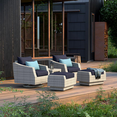 Ensemble de conversation en rotin Fionnula Sanza avec housses de coussin Sunbrella