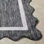 Tapis tissé à la machine Skiles-738492953