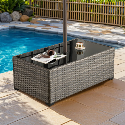 Rectangular Wicker/Rattan Outdoor Coffee Table With Umbrella Hole by Ebern Designs