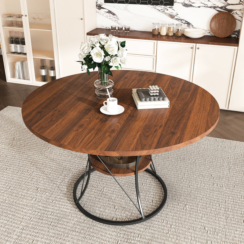 Table de salle à manger ronde extensible 4 à 6 places (110 à 150 cm), placage noyer et métal noir, fermeture à rail, grain naturel, étagère renforcée, chaises non incluses, design scandinave, piètement en métal, résistant aux égratignures
