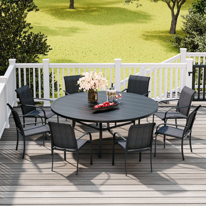 Ensemble de salle à manger de patio avec table de salle à manger ronde en métal et 8 chaises empilables en polyester enduit de PVC