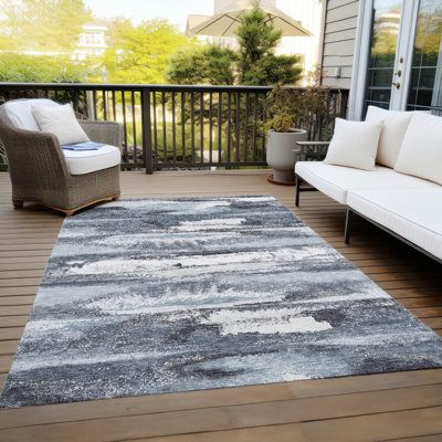Tapis rectangulaire Aleighna avec envers antidérapant