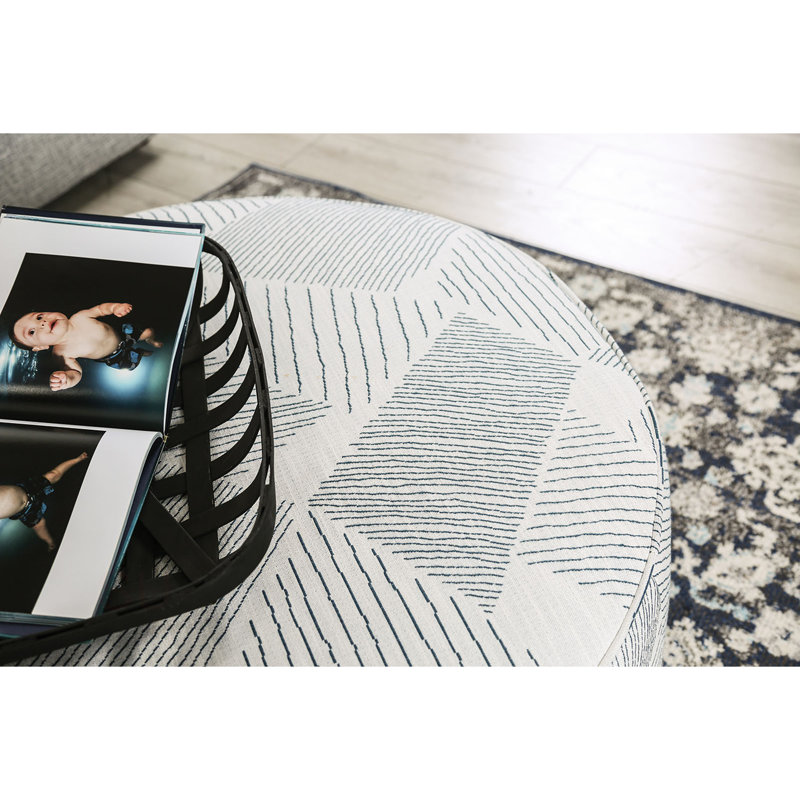 Repose-pieds rond avec garniture de style transitionnel gris et bleu marine