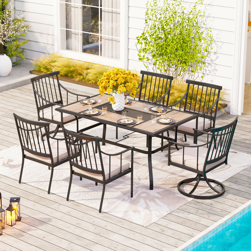 Argyri 6 - Person Patio Dining Set with Rectangular Table , Cushions Included