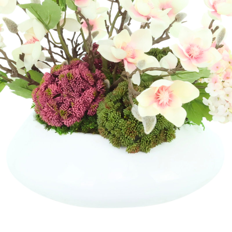Arrangement floral hydrangées et magnolias