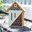 Hôtel pollinisateur d'insectes en bois à compartiments multiples