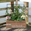 Boîte à fleurs avec treillis