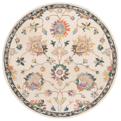 Darricka Tufted Wool/Cotton Performance Floral Rug in Beige/Lavander