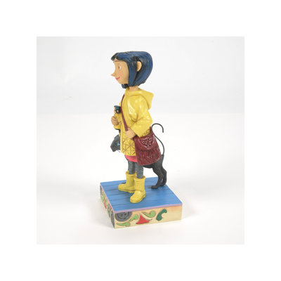 Figurine Jim Shore Coraline dans un imperméable jaune 6,34 po