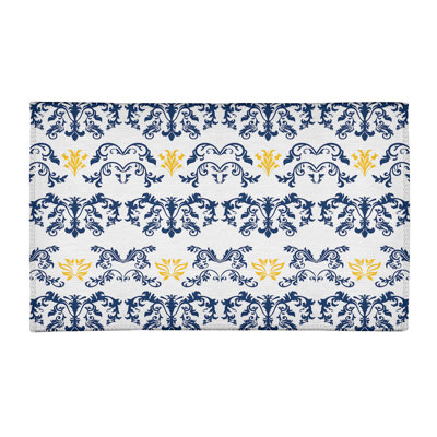 Tapis damassé blanc / bleu marine
