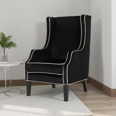Fauteuil à oreilles en velours