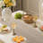 Cotton Blend Hemstitched Embroidered Striped Table Runner With Tassels-113878479-113878477