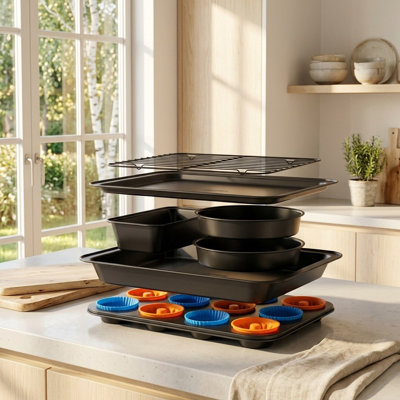 19-Piece Nonstick Baking Set—Baking Sheets, Cake Pans, Bread Pans, Muffin Tins, and Silicone Cups—All in One Box. Space-saving storage, and endless baking possibilities.