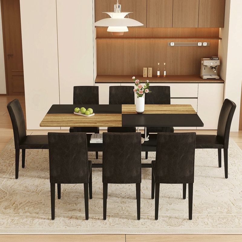 Ensemble de table et de chaises.Une table de salle à manger circulaire épissée de couleur moderne - rangement double couche.Ajoutée à la technologie des chaises de salle à manger en tissu, simple et polyvalente, confortable.