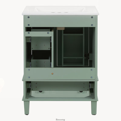 Meuble-lavabo blanc de 61 cm (24 pouces) avec lavabo en céramique intégré, tablette double fixée à la porte et tiroirs à fermeture amortie.