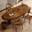 Brown Curved Solid Wood Dining Table-1917722433