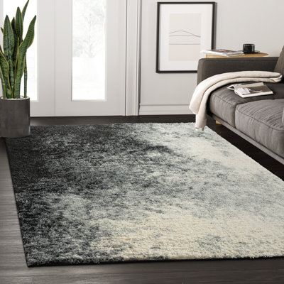 Tapis abstrait gris et ivoire