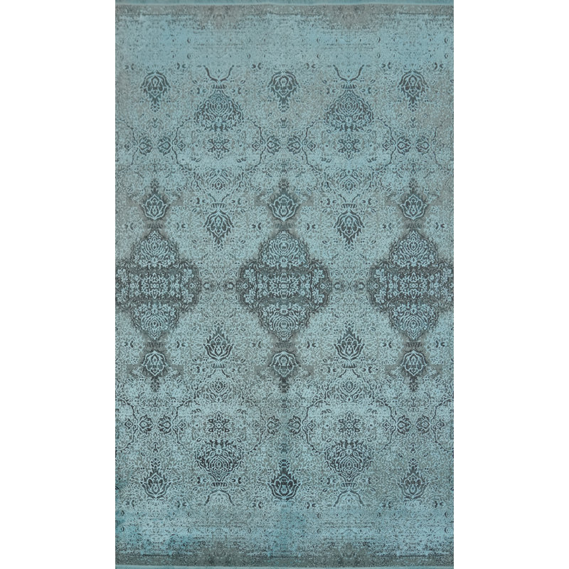 Tapis bleu sophistiqué 5 x 7 pour rehausser votre décor