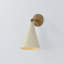 Pawley Wall Sconce in Historic Bronze and Soft Sand by Cortney Bishop