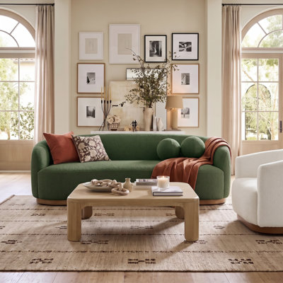 Berklie 88"W Modern Curved Sofa with Solid Wood Base and Round Pillows