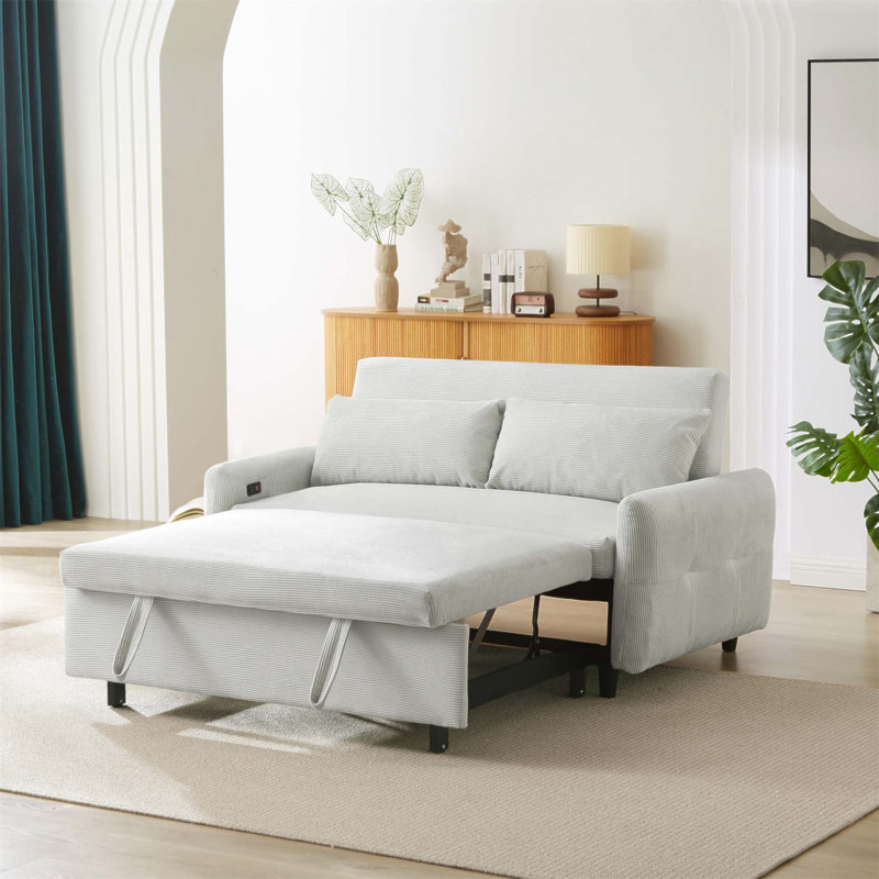 Canapé-lit convertible moderne avec ports USB, deux coussins décoratifs et conception escamotable pour un salon polyvalent