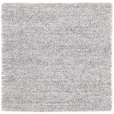 Tapis touffeté à la main
