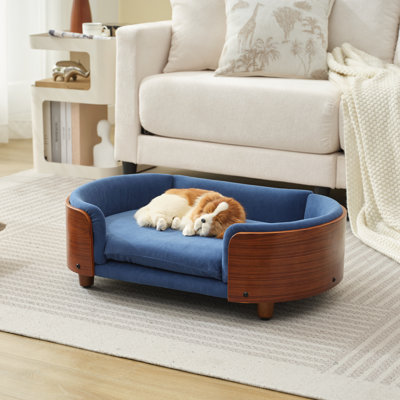 Lit pour chien surélevé de style scandinave avec pattes en bois massif et dossier en bois courbé noyer, velours bleu foncé, petite taille