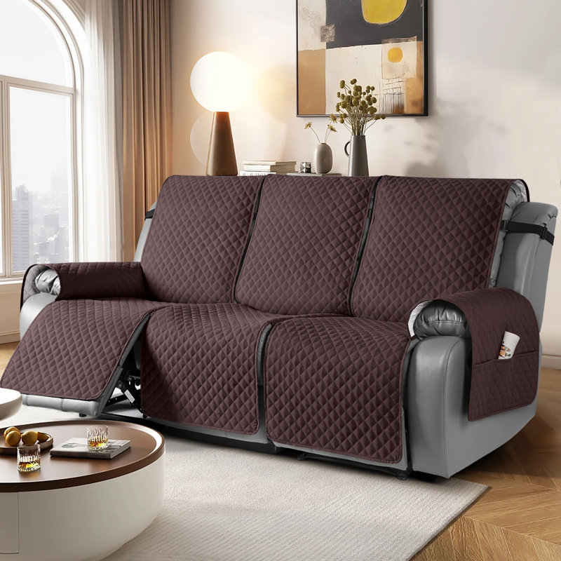Housse antidérapante pour canapé à 3 places Kyrstie, Mélange de polyester brun