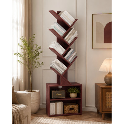 A Modern, Tall, And Slender Bookshelf Featuring A Warm Cherry Wood Finish—Combining Storage And Display Capabilities To Adorn Any Corner Of Your Home.
