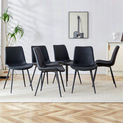 Black artificial leather backrest cushion dining chair, black metal legs, curved widened cushion design for more comfort, suitable for restaurants, kitchens, bedrooms, offices.(6 chairs)