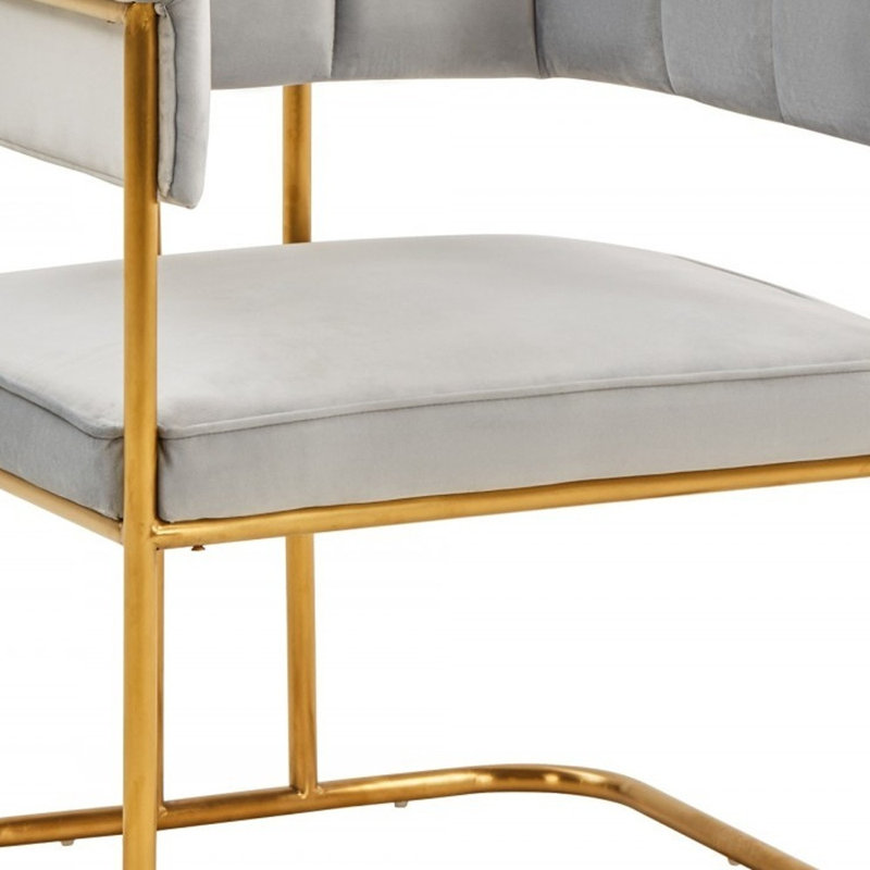 Chaise de salle à manger rembourrée grise et dorée