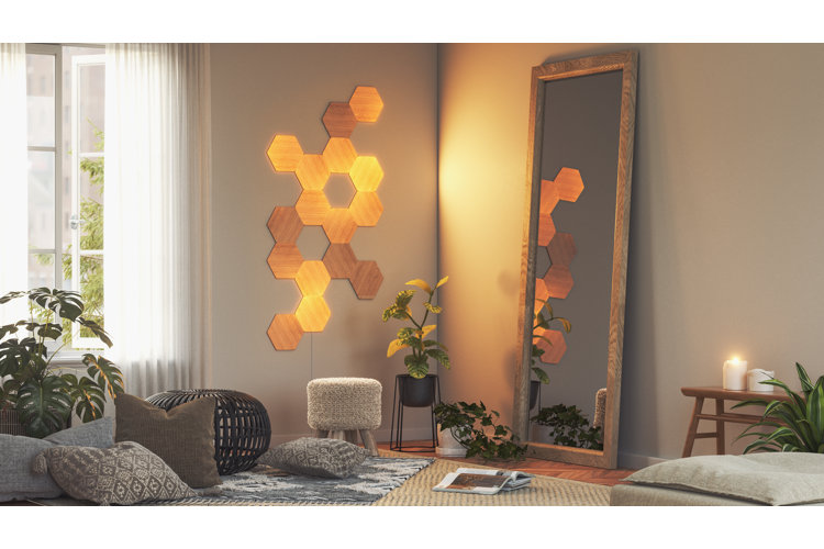 beautiful beige meditation room with a floor mirror, yoga mat, and plenty of floor pillows