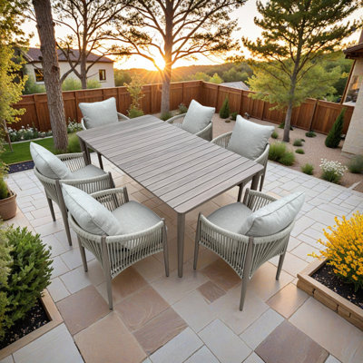 Bali Brown Aluminum Outdoor Dining Table Set with a Rectangular Dining Table, 6 Dining Chairs, and Cast Natural Cushions