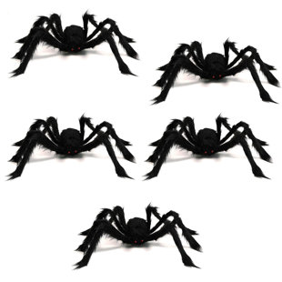 Premium Photo  Black spiders on a web on an orange halloween