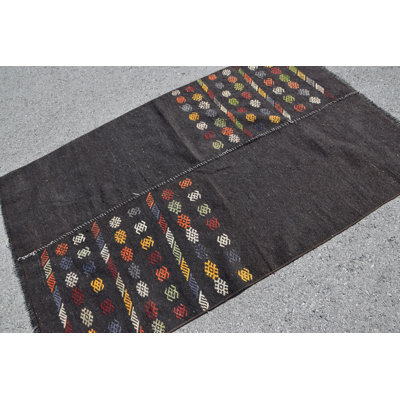 Handwoven Black Turkish Kilim Rug with Tribal Patterns for Bedroom or Living Room