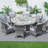 Natascha 8 - Person Wicker Patio Dining Set with Round Table , Cushions Included-70106014