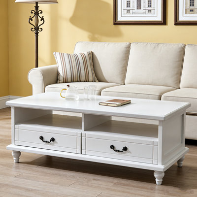 Table basse moderne avec tiroir et pieds en forme de calebasse