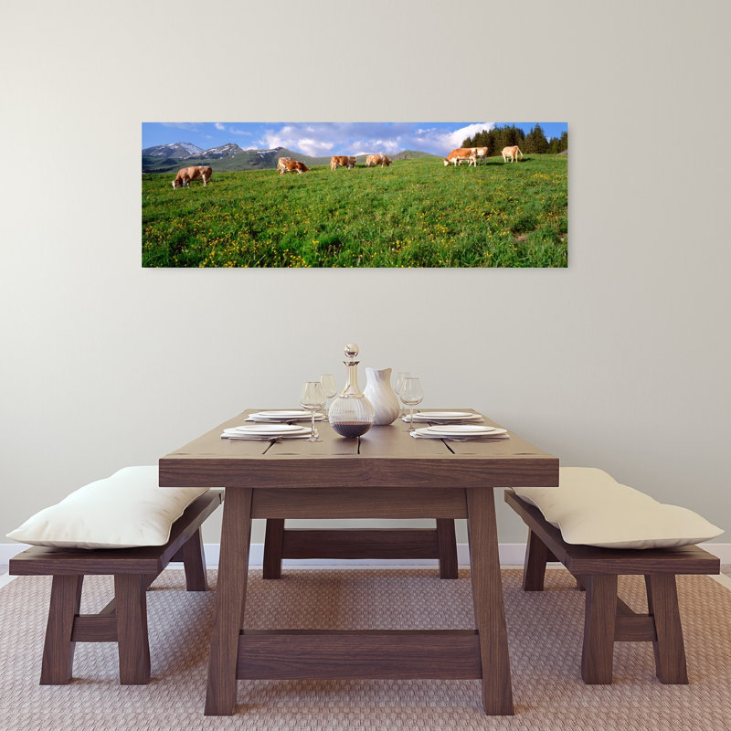 Switzerland Cows Grazing In The Field by Bo Brännhage - Wrapped Canvas Panoramic Print, 40.64 cm H x 121.92 cm W