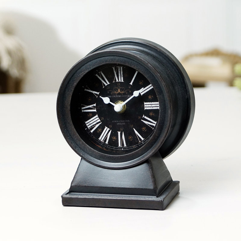 Horloge de table analogique à quartz en métal noir