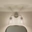 Éclairage pour salle de bain 2 lumières au fini nickel brossé avec abat-jour en verre transparent