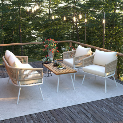 Ensemble de 4 pièces de mobilier de patio en corde Boho, mobilier d'extérieur avec table en bois d'acacia, ensemble de conversation de patio avec assise profonde et coussin épais pour le balcon de la cour arrière, beige