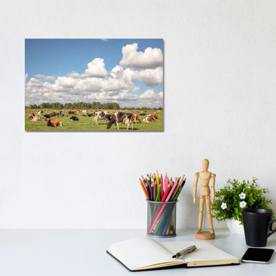 Grazing Cows In A Meadow by Clara Bastian - Wrapped Canvas Print
