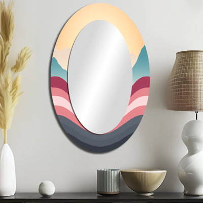 Miroir mural ovale grand format sur support métallique – Motif graphique audacieux représentant un coucher de soleil dans des tons bleu sarcelle et rose