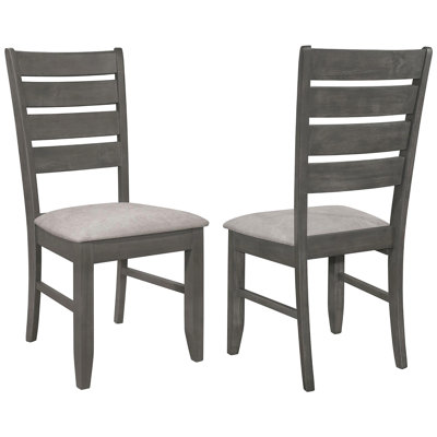 2 chaises de salle à manger grises - rembourrage en mousse et côté de conception moderne pour un dossier élégant