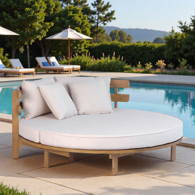 Lit de jour d'extérieur rond avec dossier à lattes demi-rond, coussins moelleux, coussin pliable, housses de coussin amovibles et repose-pieds réglables